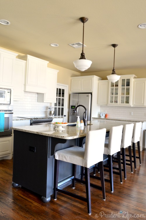 Huge Black Island in White Kitchen