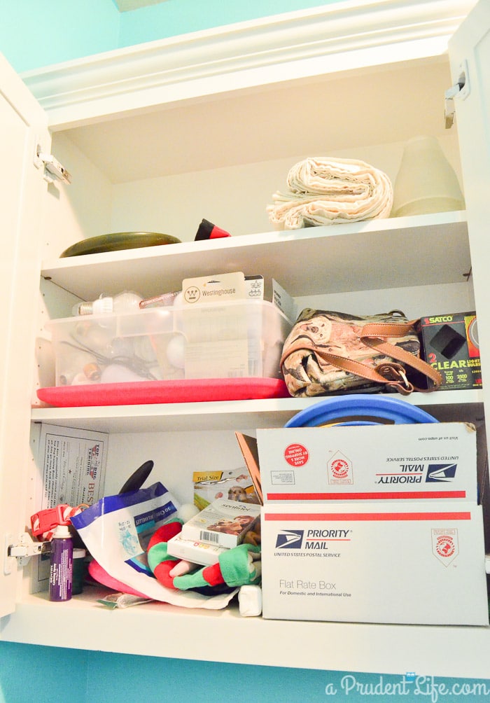 Laundry Room Cabinet BEFORE Organization