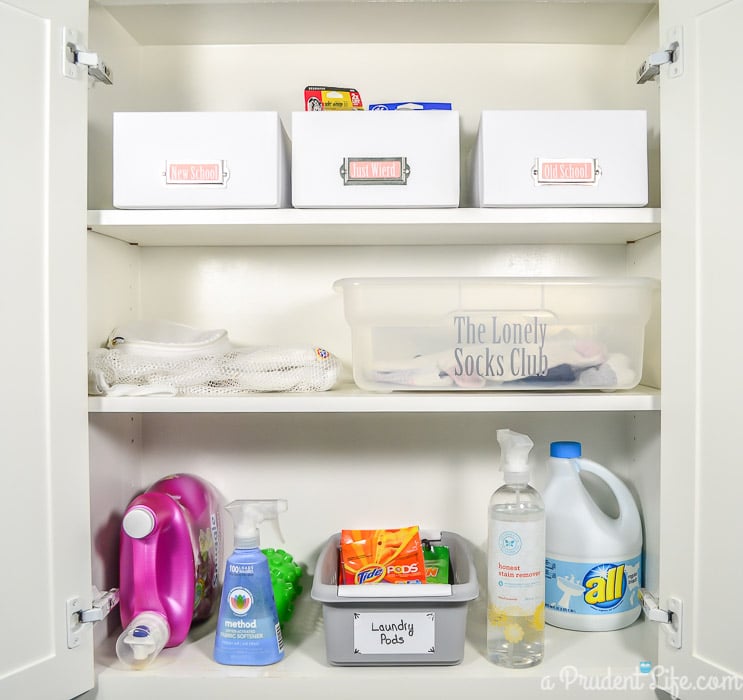 Organized Laundry Room Cabinet - Click to see the full room!