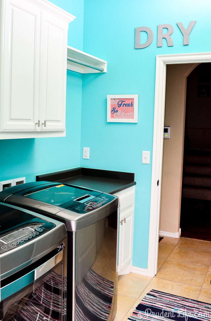 Bright & happy organized laundry room makeover - Under $100! 