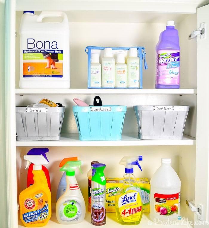 Organized laundry cabinet - click to see the full room!