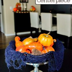 Turn a thrift store candle stick & dollar store materials into a cute Halloween centerpiece in under a minute!