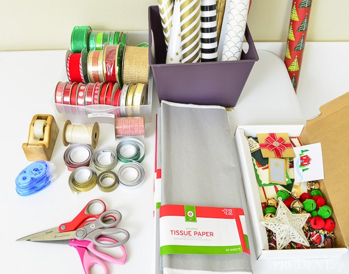 Getting organized: Paper wrap with Christmas theme, scotch tape