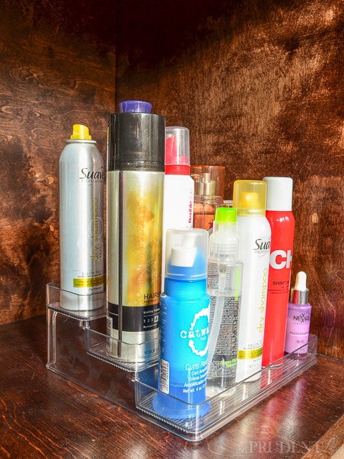 Great idea! Organize hair products under the sink on a tiered organizer.
