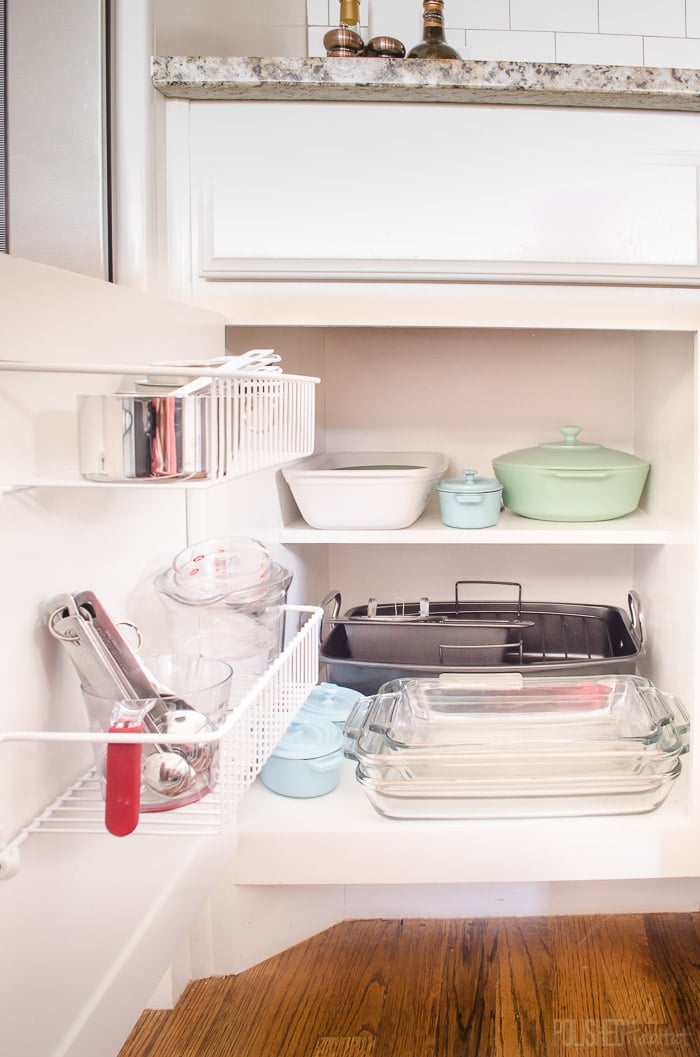 Don't overlook cabinet doors when organizing a kitchen. Inexpensive wire shelves are great for bulky kitchen accessories like KitchenAid mixer attachments! See more kitchen organizing at PolishedHabitat.com