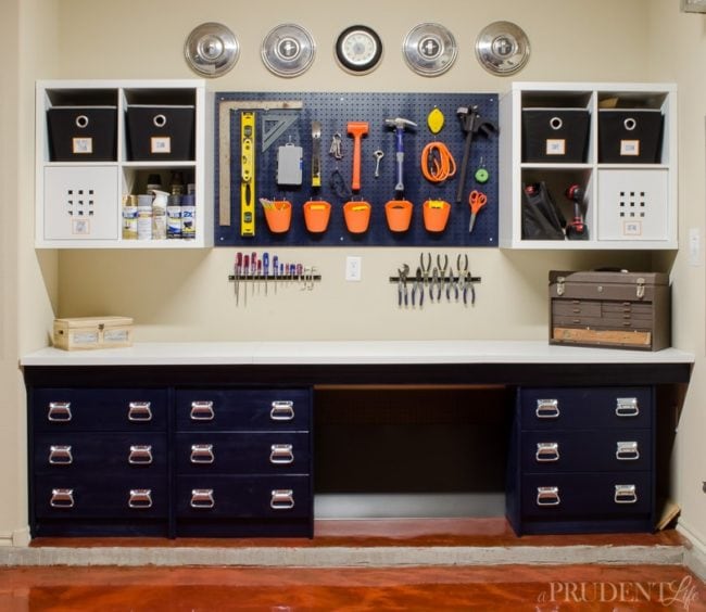 Our DIY work bench was put together with IKEA supplies to keep the price low. Using RAST dressers, LINNMON table tops, and KALLAX shelves let us customize the perfect space on a budget. Adding a pegboard creates even more storage without adding much cost.