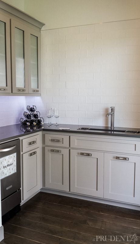 Bringing back the wet bar? This new construction home had a mini-kitchen tucked away inside, but close to the pool