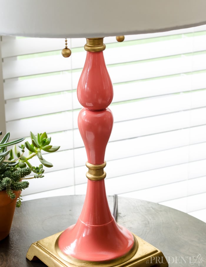 This simple lamp makeover proves that chic decor doesn't have to break the bank! The before lamp was stuffy and boring, but now I've got a coral and gold gem that instantly makes our living room feel more fresh and modern.