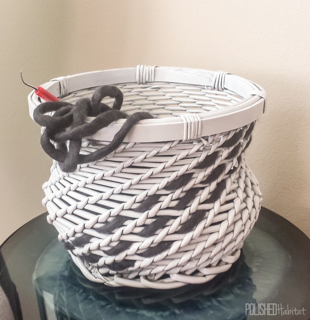Thrift store basket transformed. Paint and chunky weight yarn give this old basket a fresh new look.
