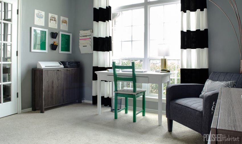 Black and white curtains make a bold statement in this chic home office. Emerald green pops against all the neutrals - click for a full tour and the before photos! 