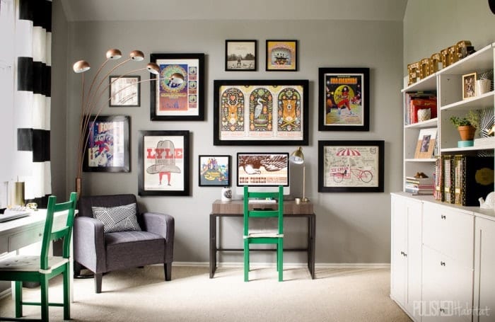 A variety of concert posters collected over the years turned into a grand gallery wall when paired with matching frames. Click for the full room tour!