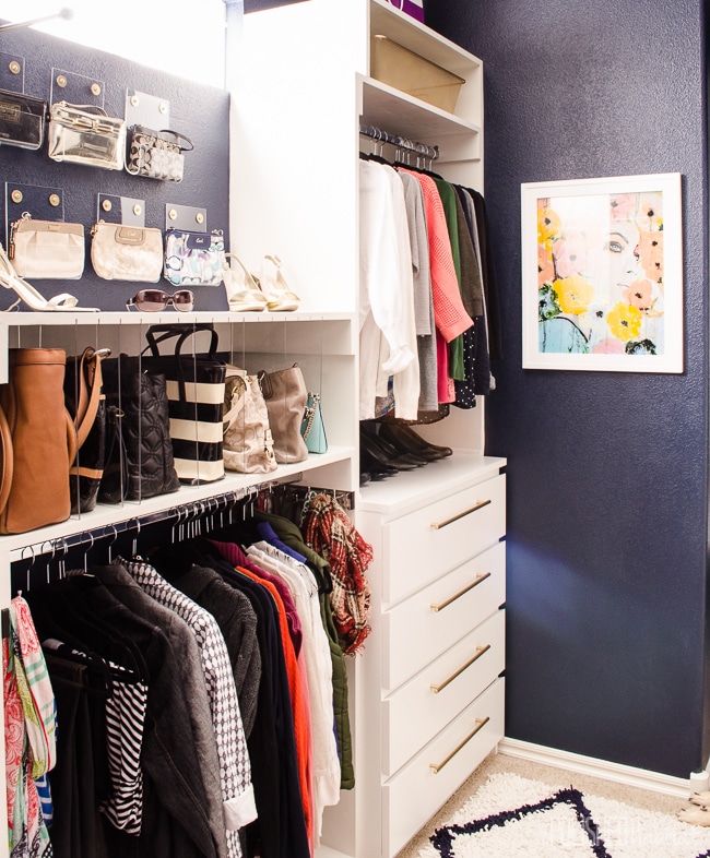 Dream closet alert! There is an organized spot for EVERYTHING, but the purse storage and drawers are my favorites.