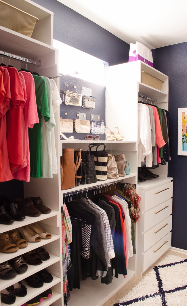 Dream closet alert! There is an organized spot for EVERYTHING, but the purse storage and drawers are my favorites.