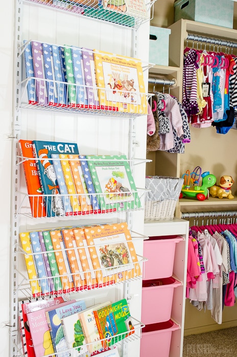 I LOVE this idea for kid's book storage. Using the space on the back of a closet door was so smart. More baby closet organization ideas are in the full post. Click for details!