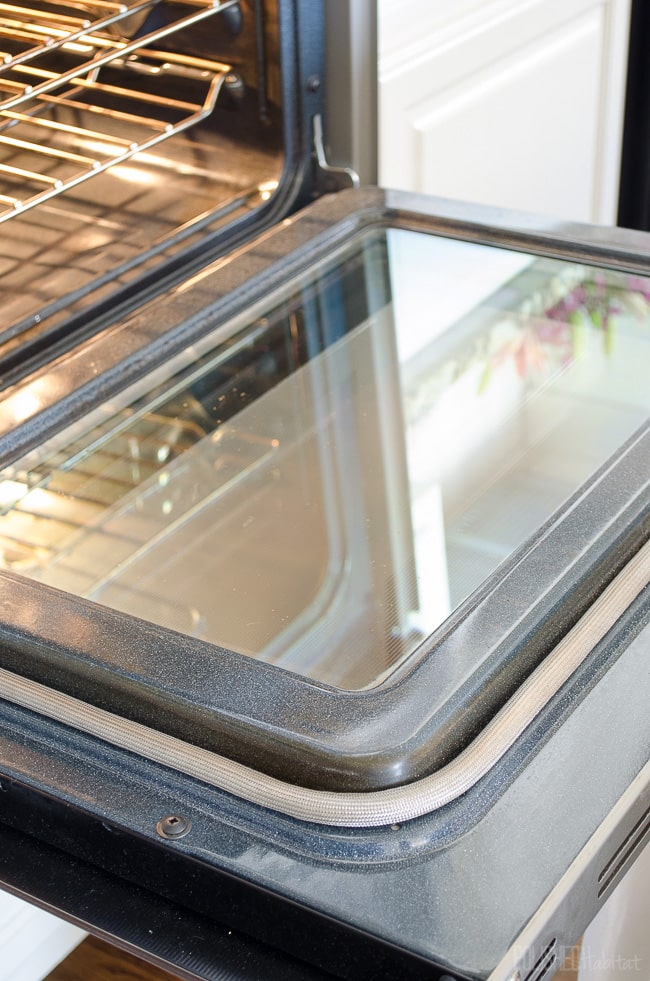This clean oven glass used to be totally nasty. I can't believe she got it this clean without chemicals!