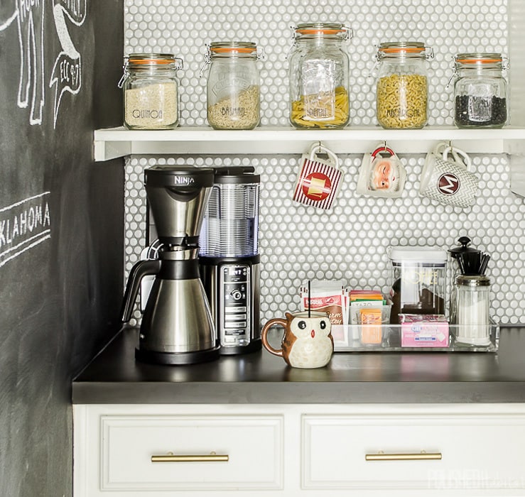 Organizing a coffee bar on the counter let you start your day without frustration. Everything you need is easy to grab while you are still half-asleep. I love that acrylic tray! 