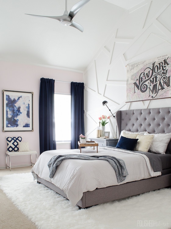 Modern Glam Bedroom with Gray Tufted Headboard - Love the blending of modern and glam with a little downtown edge! 