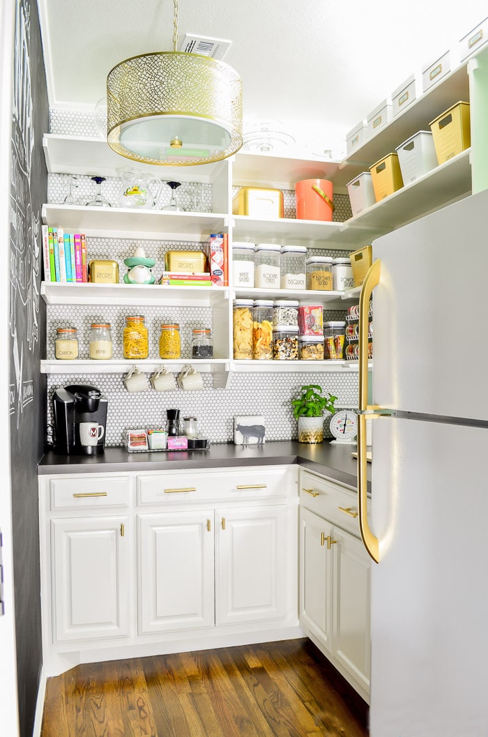 Walk In Pantry with Gold Cabinet Hardware