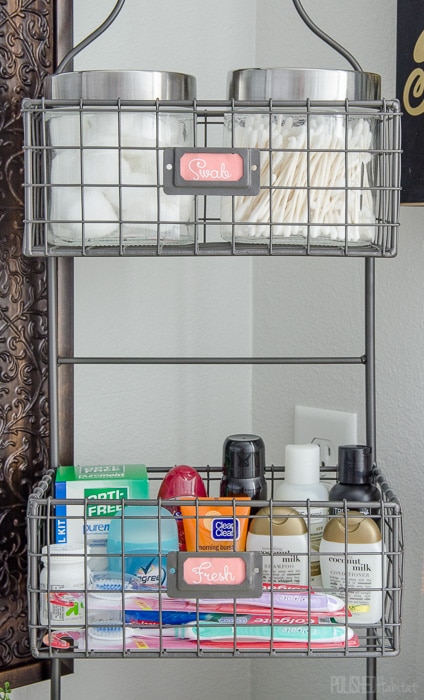 Use a tiered organizer to add lots of bathroom storage on a budget. 