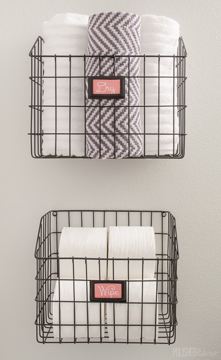 Mount baskets on the wall to add bathroom storage without paying for a pricey cabinet.