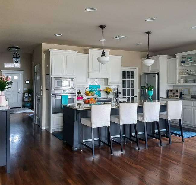 White kitchen with black island - Polished Habitat Home Tour Spring 2017