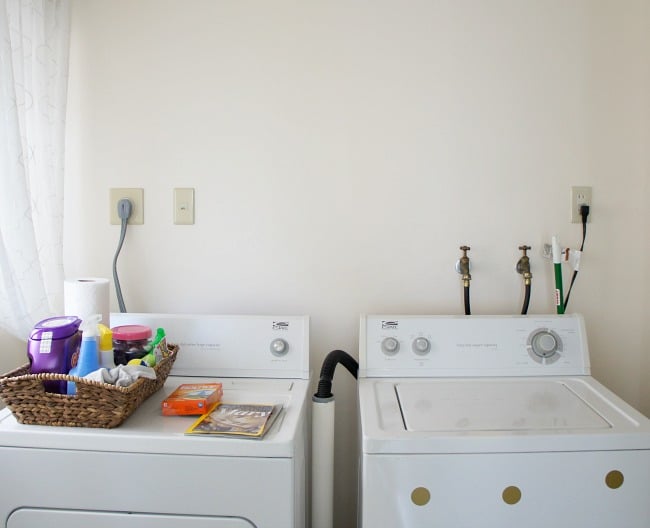 hide cords and hoses in the laundry room with this easy DIY