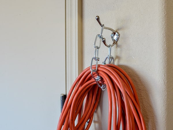 How to Storage Extension Cords in the Garage - Click for more quick garage organizing ideas! 