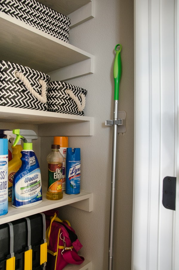 Command Broom Hanger in Organized Closet