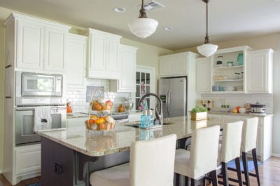 Kitchen with orange and teal accents