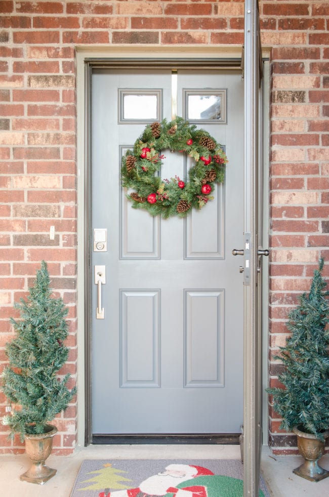 Brick Home with Gray Door & Silver Hardware