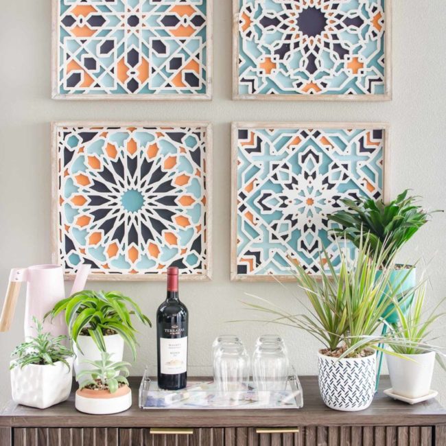 Colorful art and console styling in small kitchen nook. 