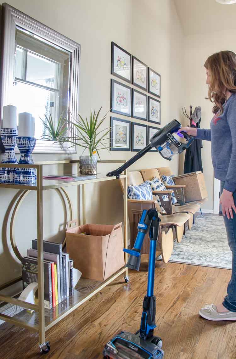 Using Shark IonFlex vacuum for dusting. 