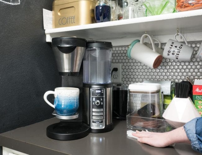 Cleaning around the coffee maker