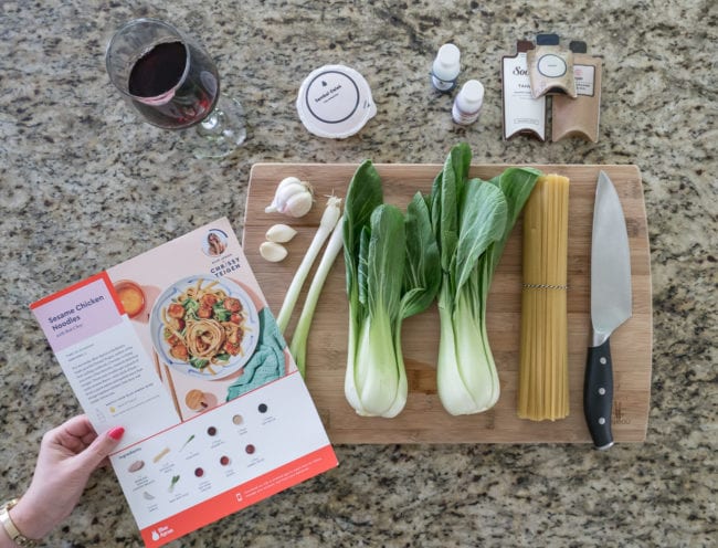 Fresh ingredients on a cutting board for a Chrissy Teigan Recipe from Blue Apron.