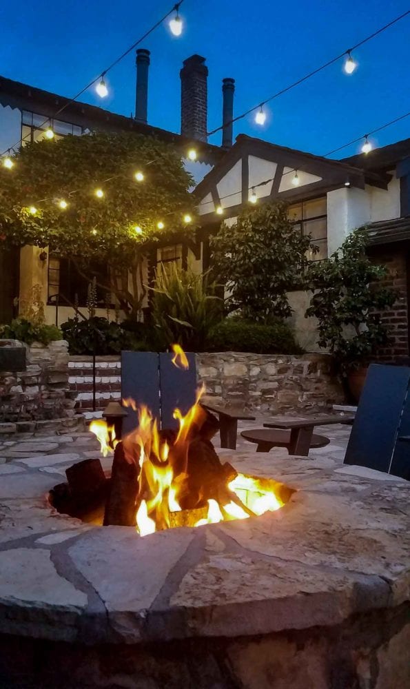 Firepit in stone courtyard - Vagabond House Inn