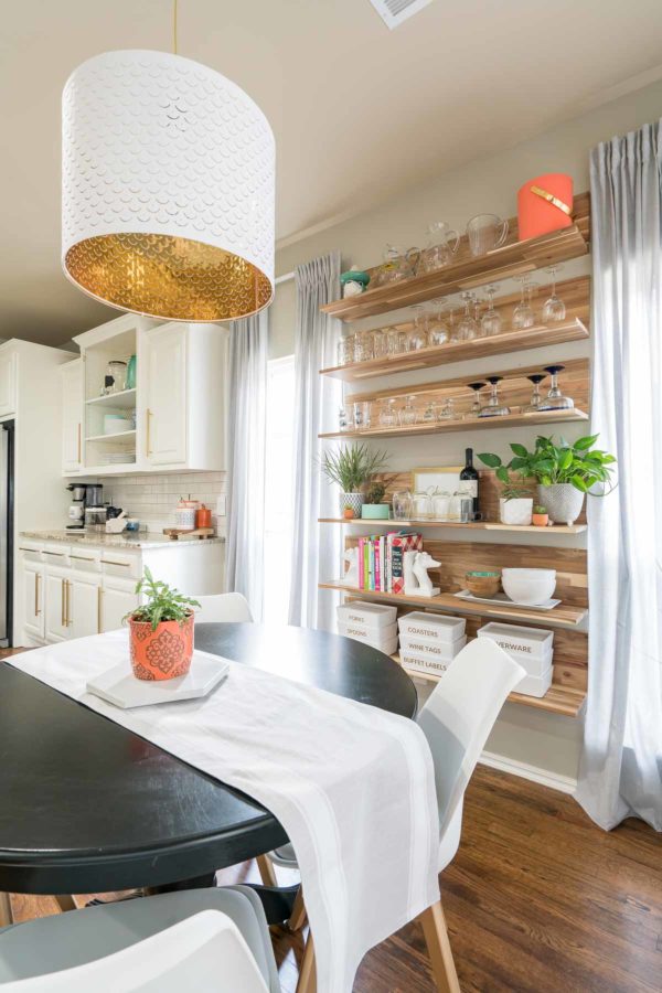 Wooden shelves in eat-in kitchen nook