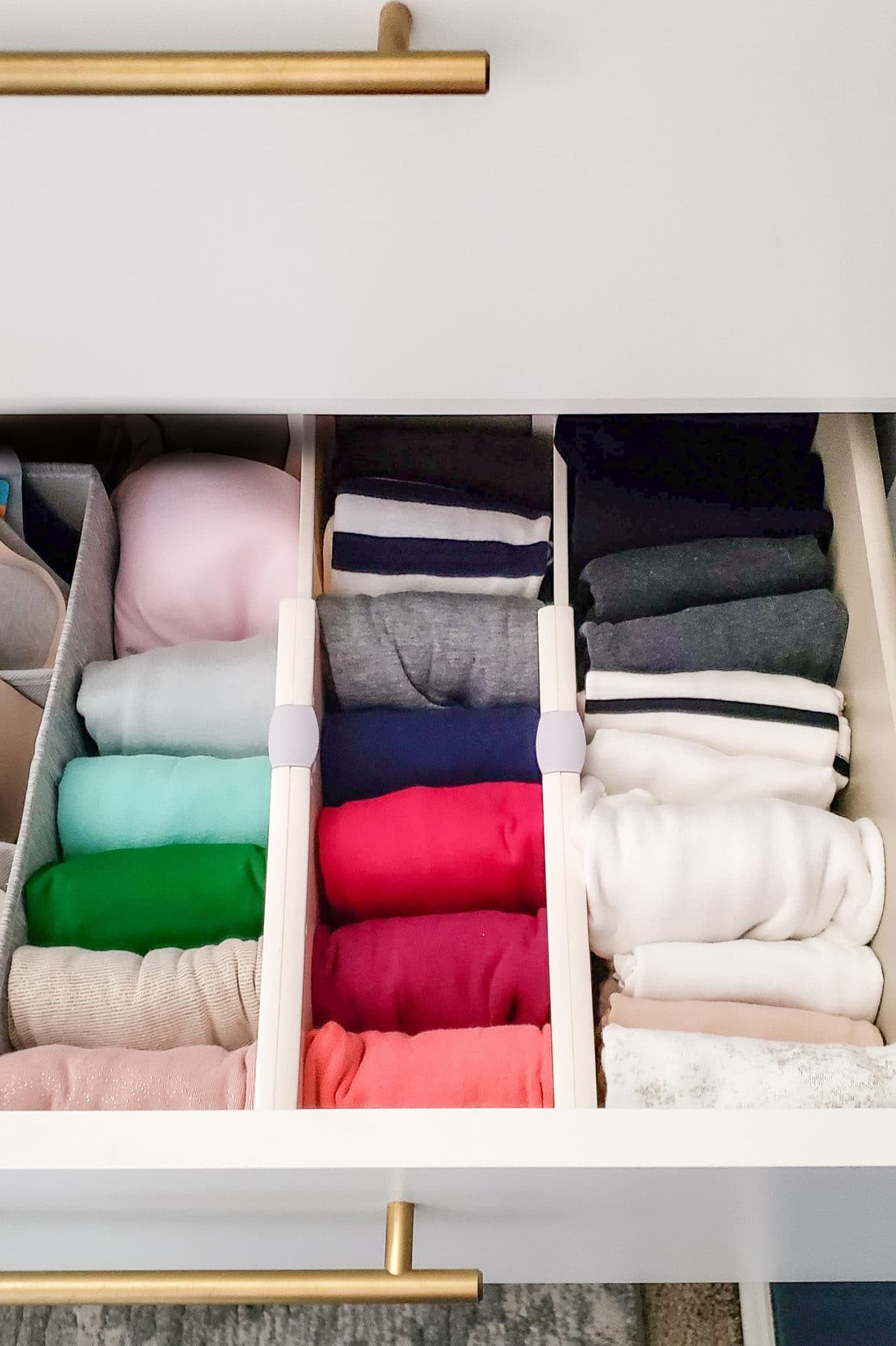 Colorful tank tops in dresser drawer