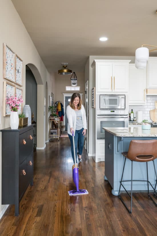Cleaning a wood floor with a Swiffer WetJet