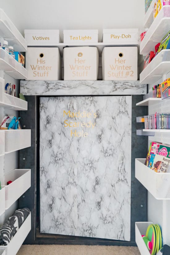 Storage closet with racks on side walls 