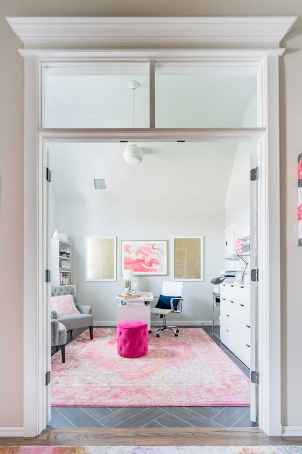 Office with White Furniture, Pink Rug, and Gold Accents