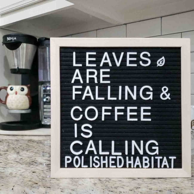 Black letter board with white letters - Leaves are falling & coffee is calling.