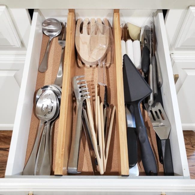Servingware in organized kitchen drawer