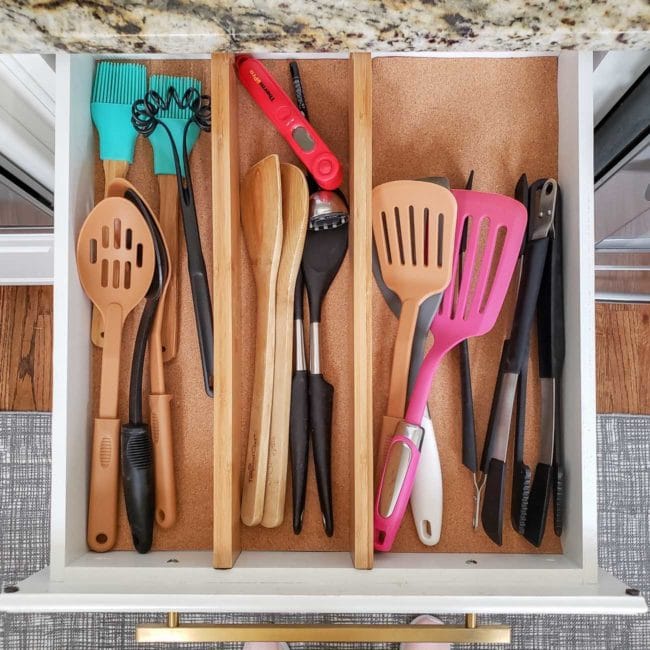 Kitchen cooking utensils in organized drawer