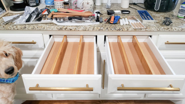 Wood dividers show in empty kitchen drawer