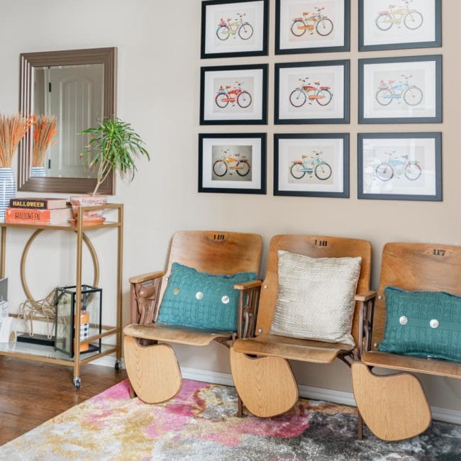 Entry way with theater seats decorated for fall