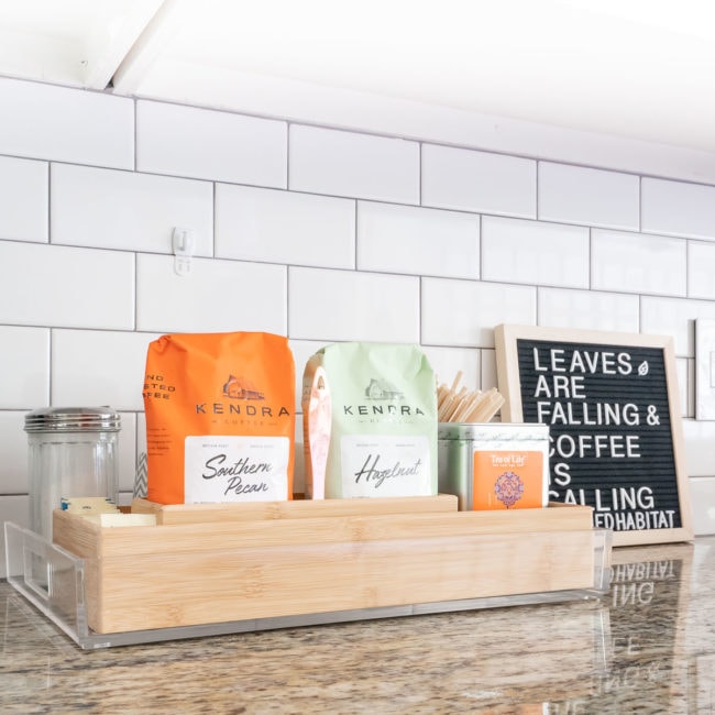 orange and mint bags of coffee in tray