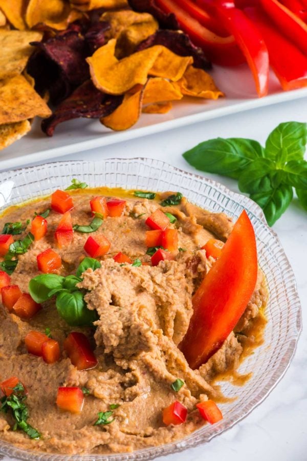 Red pepper slice in hummus