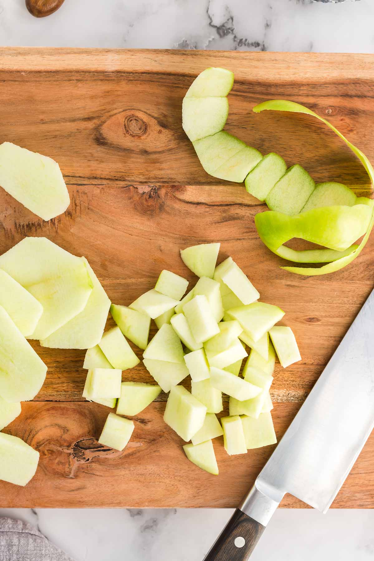 Apples diced on cutting board