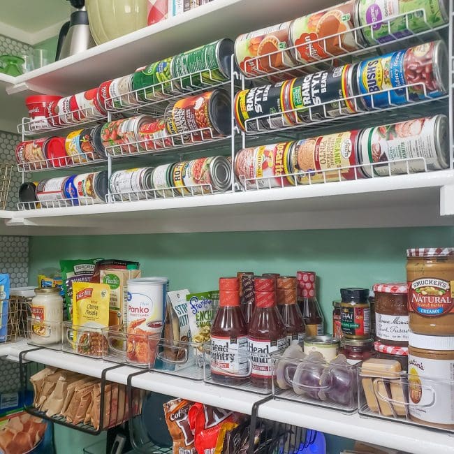 Pantry organization - racks for cans and clear bins for pantry staples