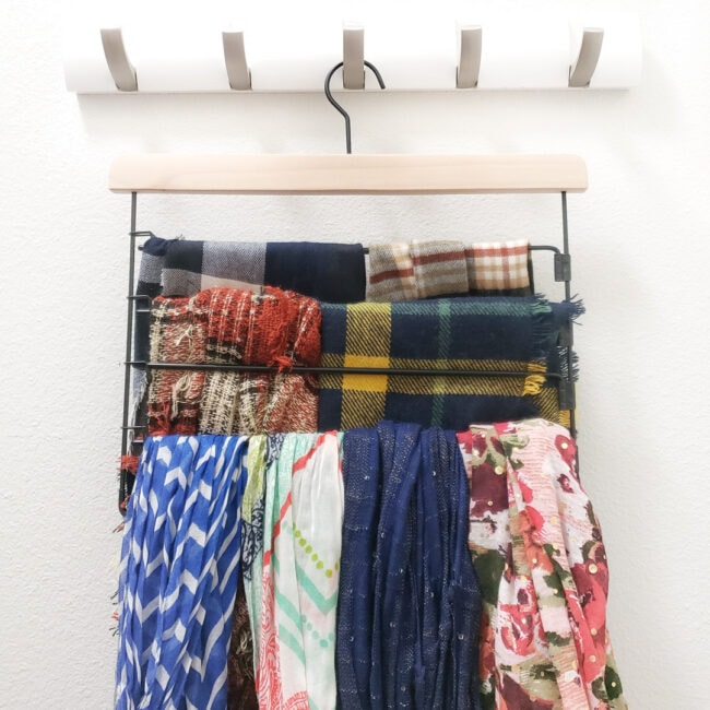 Womens scarves on multi-level pants hanger